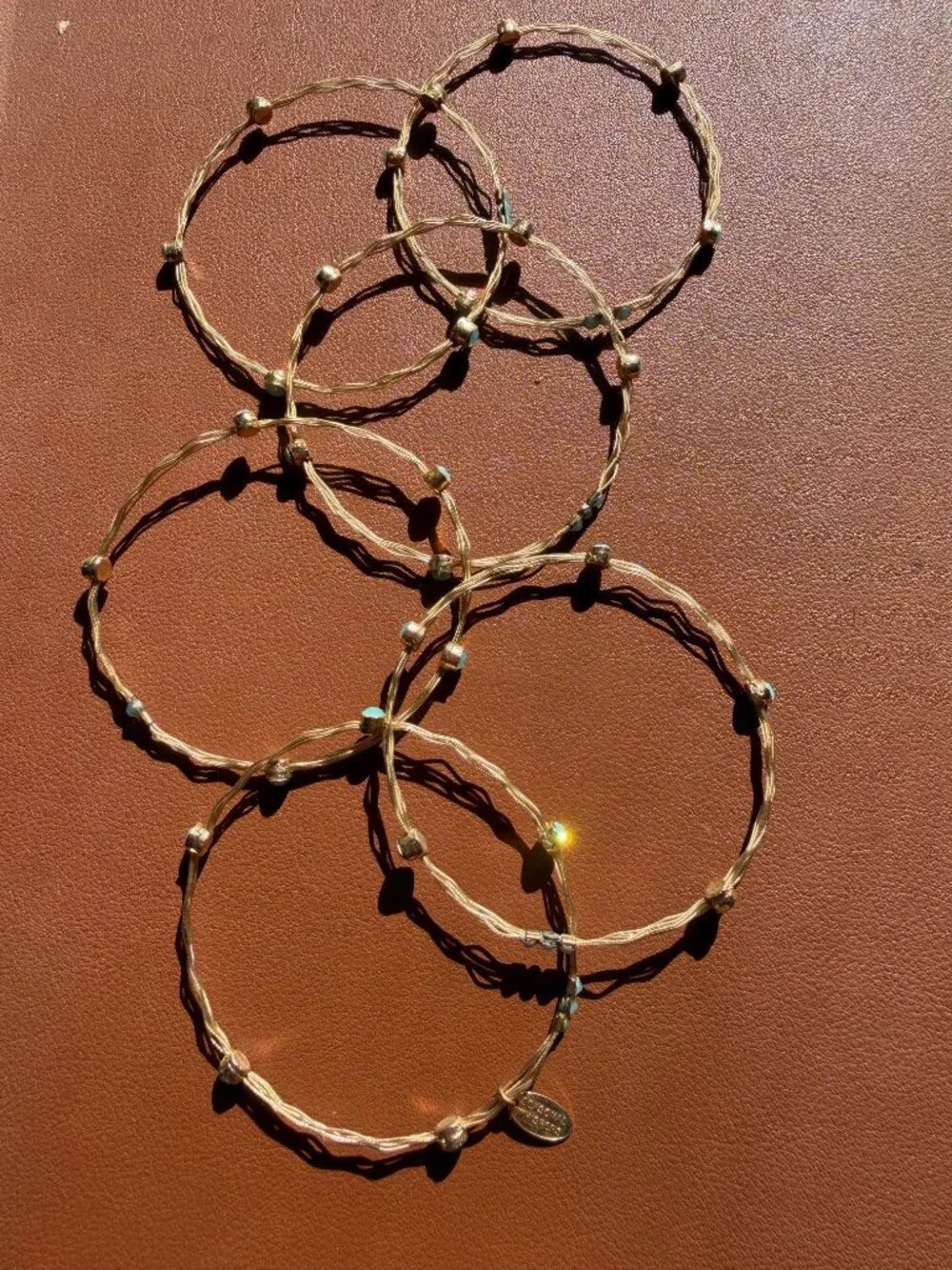 Gold and turquoise opals bracelets by Seasonal Whispers